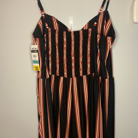 3/20$ Large jump suit from Giant Tiger. Can’t return. NWT. - Picture 3 of 4